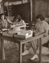 The women make hats and fish-scale flowers..