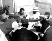 African American men playing cards - Moore Haven, Florida