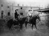 Two cowboys wearing handguns- Gainesville, Florida