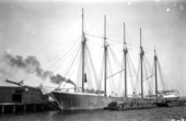 Schooner loading lumber at Pensacola Harbor - Pensacola, Florida.