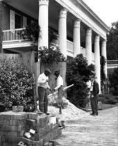 Workers at work by the Florida Governor's Mansion - Tallahassee, Florida.