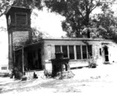 Clock tower and house of the Phillips home at 815 South Macomb Street - Tallahassee, Florida.