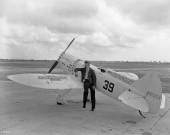 Harold Neumann with Miss Chevrolet in Miami, Florida.