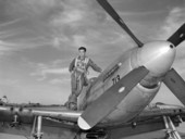 National Guard pilot Bill Yoakley posing on the wing of a plane - Jacksonville, Florida.