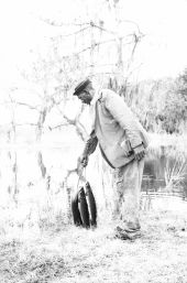 Man holding up fish he caught in north central Florida.