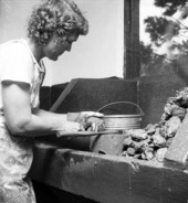 Oyster shucker at work in Apalachicola, Florida.