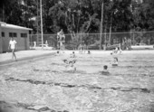 People cooling off in a Tallahassee community pool.