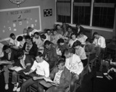 High school students studying for a Tallahassee Democrat article "Teenagers Could Make Better Grades".