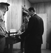 "Tallahassee Ten" member, Reverend Arthur McArven Warner from New York City, being fingerprinted.