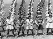 All American Girls Professional Baseball League members performing calisthenics - Opa-locka, Florida