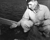 Joseph Martina on a boat with oysters - Apalachicola, Florida