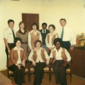 F.C.I. Superintendent William Booth in group portrait with promotion recipients, ca. 1980