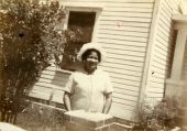 Aquilina Casanas Howell in front of the Taylor House in Tallahassee.