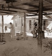 View of women washing laundry - Riviera Beach, Florida.