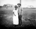 Couple standing in Lewis Field - Saint Augustine, Florida.