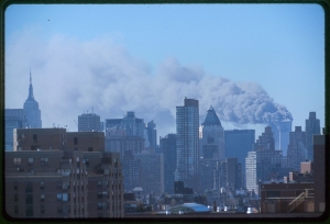 Manhattan skyline with smoke coming from the Twin Towers after the September 11th attack on the World Trade Center.