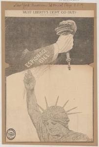 Drawing of an arm labeled espionage bill grabbing the torch from the Statue of Liberty's hand.