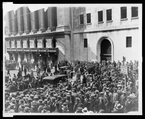 Crowd of people gather outside the New York Stock Exchange following the Crash of 1929.