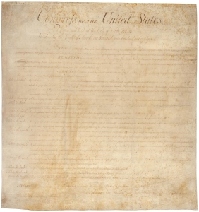 Faded first page of the Bill of Rights with the heading Congress of the United States most clearly visible at the top of the page.