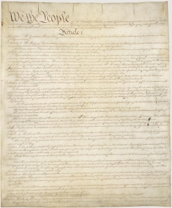 First page of the U.S. Constitution with the words We the People in the upper left corner.