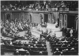 President Woodrow Wilson speaking before a joint session of Congress.