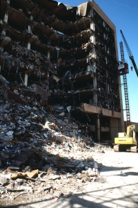 Construction workers erect an external elevator on the side of the Federal Building following the Oklahoma City Bombing.