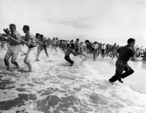 Still image taken from a Highway Patrol film depicting pro-segregationists attempting to prevent Black people from swimming at a white-only beach in St. Augustine.
