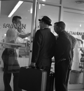 Three men attempting to enter the Savarin Restaurant at the municipal airport in Tallahassee.