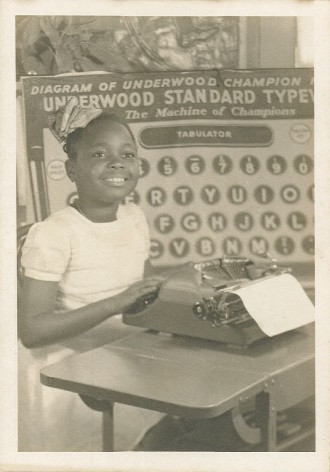  Young student at typewriter